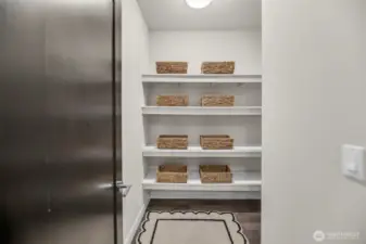Walk-in pantry located off the kitchen.