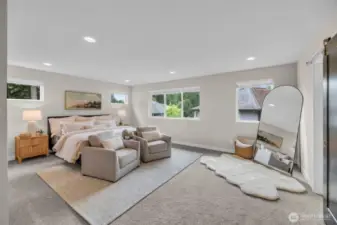 Primary Suite . . . impressive in size & its serenity. Double door entry.