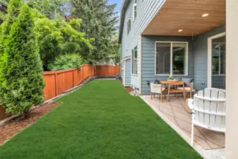 Brand new sod/lawn. There is also a fenced garden space on the size of the home.