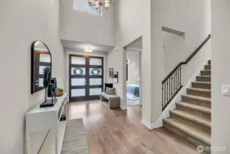 Entry foyer with soaring ceilings.