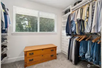 You will love this large walk-in closet, with installed organization, including plenty of room to add a dresser or other additional storage.  We appreciate the big window to let daylight in so you don't mix up your blacks & navies!
