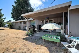 Back yard covered patio.  Big yard, fully fenced!