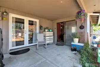 Back yard patio, with enclosed hot tub room.