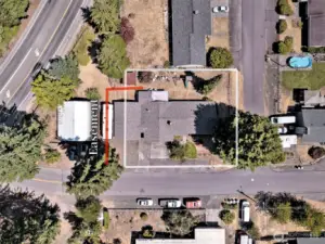 Property boundaries are approximate. The red-outlined easement refers to a wonderful easement from the neighbor allowing the carport to stay, and the seller to use the area for extra parking! Ask the Sellers Broker for details.