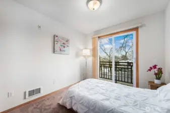 Bedroom #2 faces the building front and offers lots of natural light.