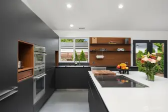 Gourmet kitchen with Thermador induction cooktop w/ separate speed microwave and convection oven