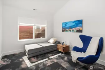 Guest bedroom w/ carpet tiles
