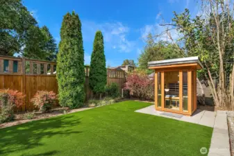 Backyard w/ an outdoor sauna