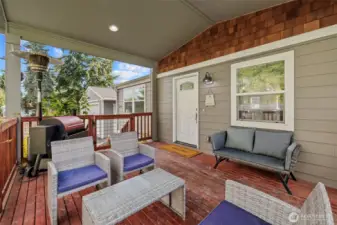 Inviting entry. Courtyard style uncovered patio just off the deck to extend your gatherings further outdoors.