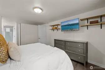 Primary bedroom with new flooring.