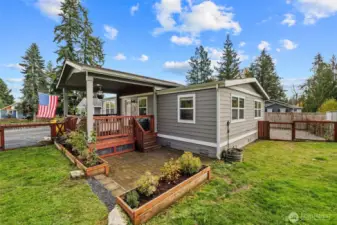 Courtyard style patio to extend your gatherings to an uncovered space.