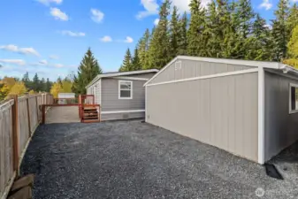 Back elevation of garage/shop and home.