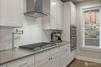 Kitchen and dining with view to the water feature in the backyard