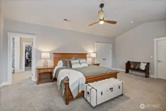 Primary suite connects to large primary bathroom and  large walk in closet