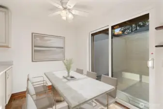 Virtually stage eating space over with sliders that open up to your private courtyard. Stringn the lights and start the grill, summer is on it's way!