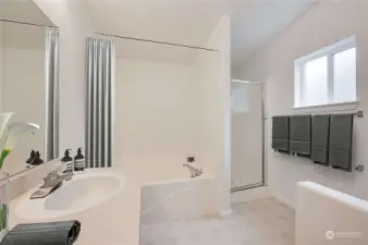 You will love the soaking tub, double sinks and separate shower.  Virtually staged.