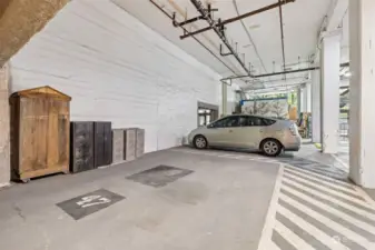 Large parking space conveniently located just off the main building's exit on the first floor of the parking garage.