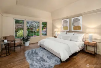 0versized Primary Suite with hardwood floors, coffered ceilings, walk-in closet