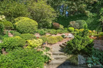 Stone steps, brick retaining walls and 2 oversized patios
