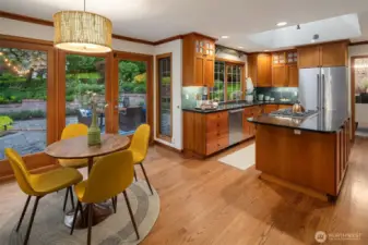 Open kitchen with french doors to one of two oversized patios