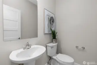 Main level Half Bathroom. New Toilet installed 2024