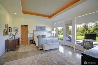 Master with stunning views of yard and bay