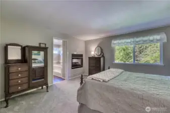 This room is very spacious with the added bonus of a gas fireplace.