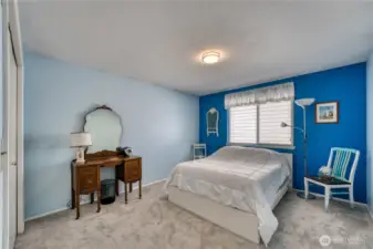 One of four large bedrooms upstairs.