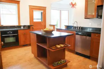 Cork floors, granite counters and modern appliances are convenient, yet still keep the charm of the house