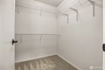 Primary walk-in closet.