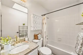 Shared upstairs hallway full bathroom.