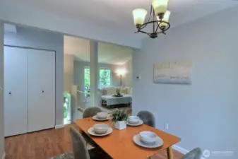 The dining area connects the kitchen to the living room, making the whole area flow nicely together.
