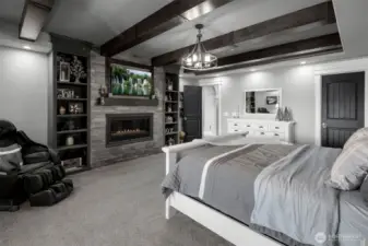 Primary room complete with beautiful fireplace and built ins.