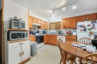 Kitchen in unit 1320. Has Linoleum flooring.