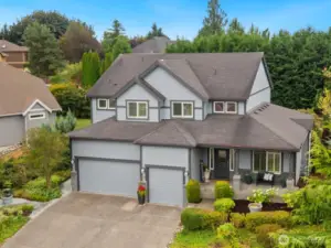 Welcome home to this stunning Zetterberg resale in Quiet Water @ Lake Tapps!