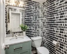 The powder room.  Remodeled and located right off the formal spaces and next to the 2 car garage entry.