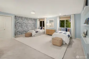 Bedroom #3 is a huge bedroom that could also be a family room or TV room.  This is located on the same floor as all the other bedrooms