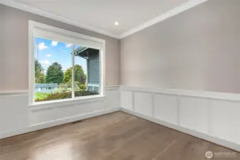 Main floor office with a murphy bed