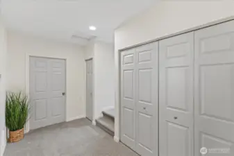 Laundry/flex area leads to storage & 3rd bedroom.