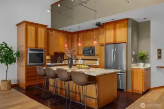 Generous island seating, high-end appliances, and thoughtful layout—ideal for hosting, cooking, and connection.