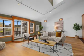 Sun-drenched living room with an open layout and flexible seating options designed for comfort and connection.