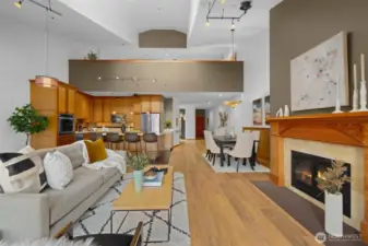 Open living and kitchen space with vaulted ceilings and warm finishes, offering an ideal layout for everyday living and entertaining.