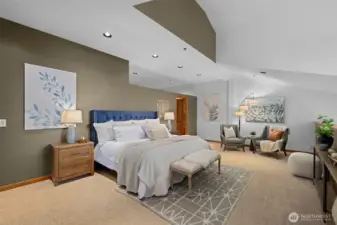 The primary bedroom offers generous space, natural light, and flexibility for guests, office, or additional living needs.