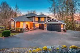 Exterior of home on one acre lot in sought after "Aspen" community. Fee simple land.