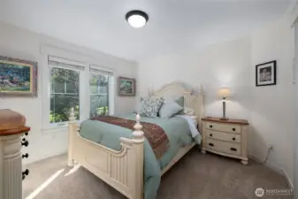 Third bedroom with wood flooring