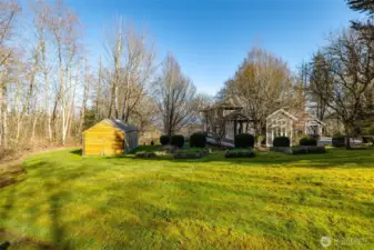 Charming garden shed with a dedicated gardening area, perfect for tools, planting, and seasonal projects