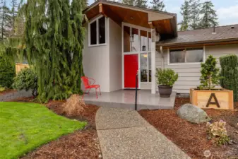 Impressive porch with ample space for decorating. Entry way windows add fantastic curb appeal.