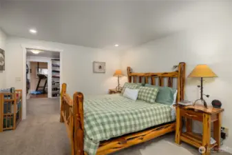 Primary bedroom, with walk0incloset and exercise room to the left.