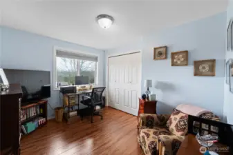 Upstairs bedroom with engineered wood floors