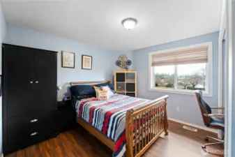 Upstairs bedroom with engineered floors